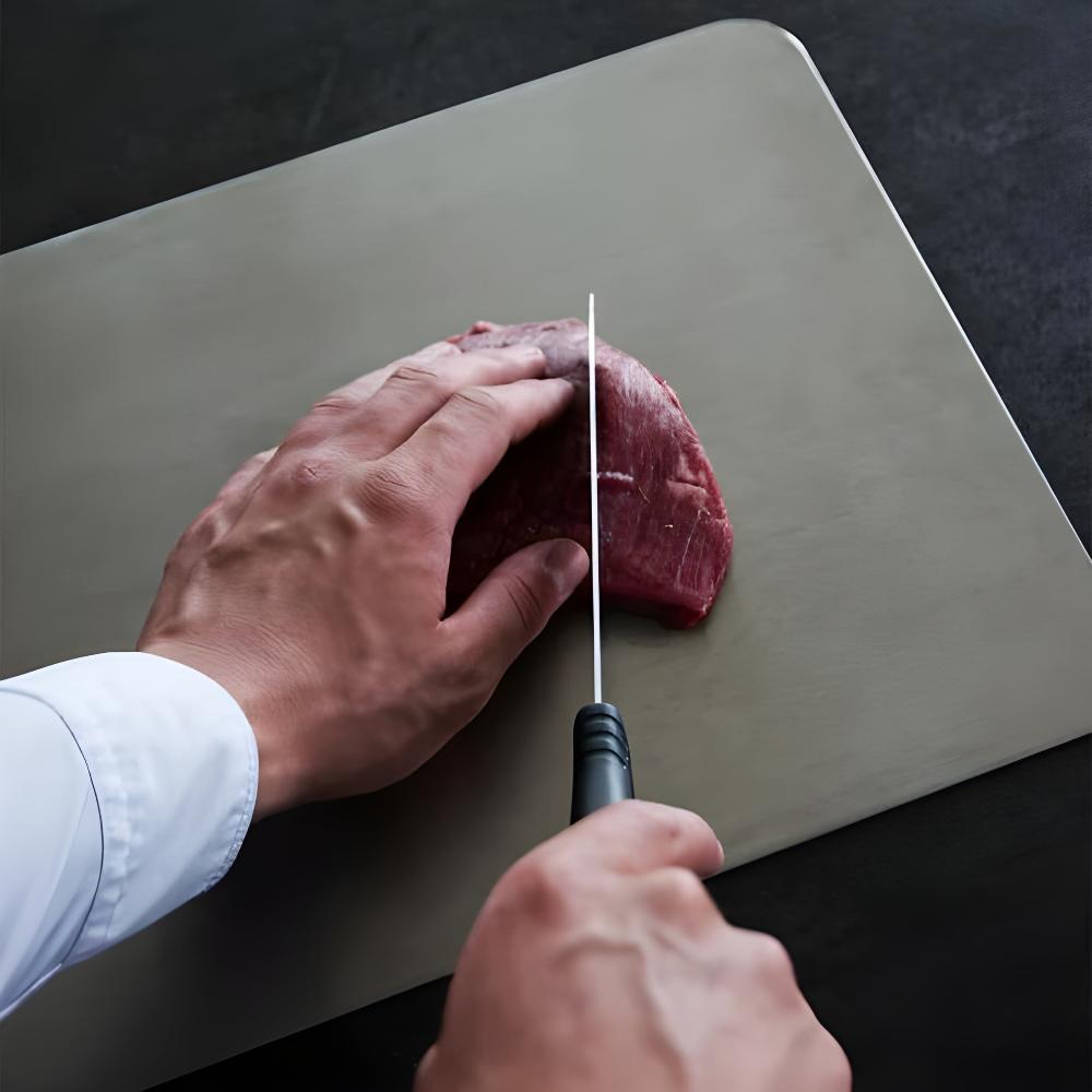 New silver cutting board made of high-quality stainless steel, essential kitchen cookware