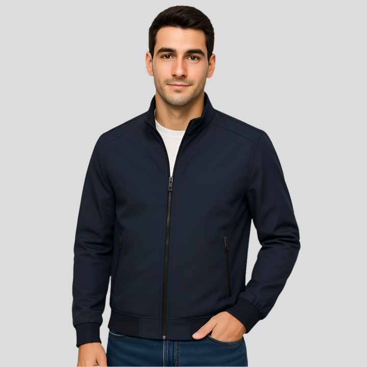 Sleek men's lightweight jacket for spring/fall, featuring zippered pockets & elastic cuffs. Versatile modern outerwear.
