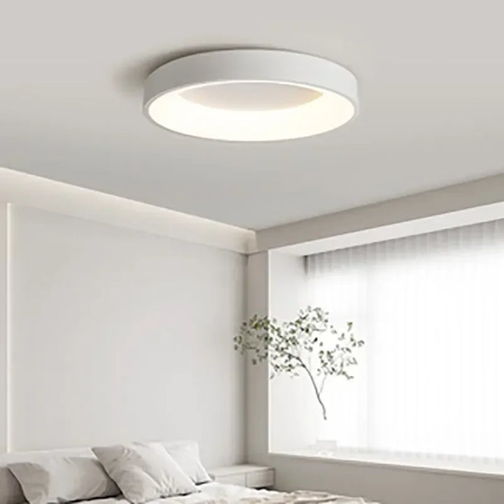Sleek Modern Nordic LED ceiling light. Round minimalist design, perfect for living room or bedroom lighting.