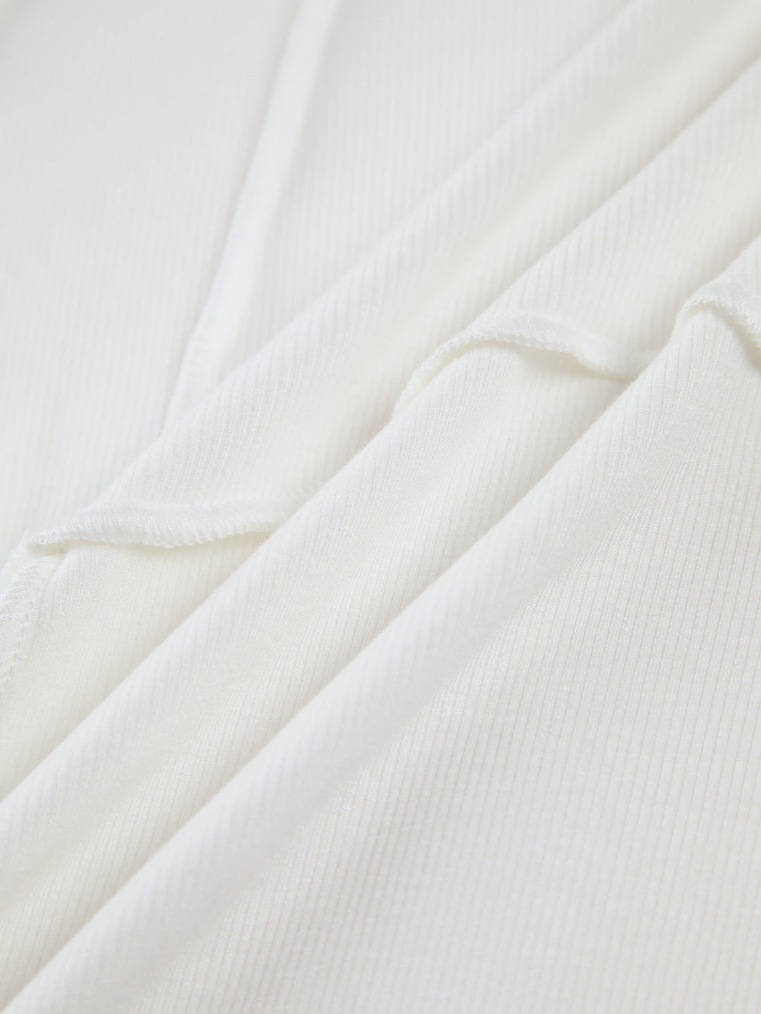 Modern women's ribbed long sleeve top, offering a comfortable and fashionable option for any occasion.