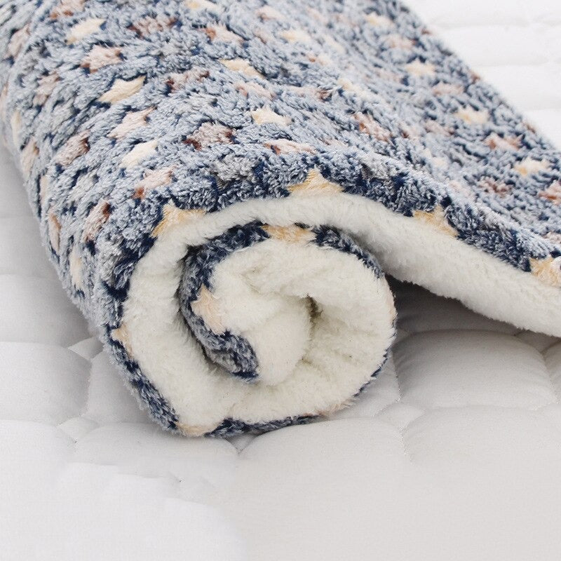 Soft calming pet blanket for ultimate comfort. Ideal as a cozy dog bed or cat bed, providing warmth & security.