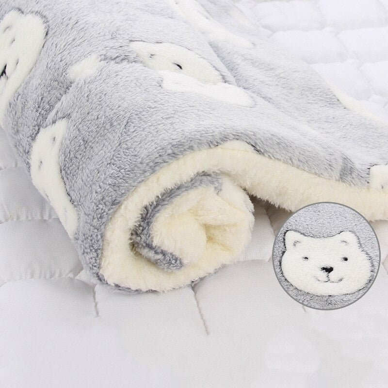 Versatile calming pet blanket, perfect as a dog bed, cat bed, or furniture protector. Offers ultimate cozy comfort.
