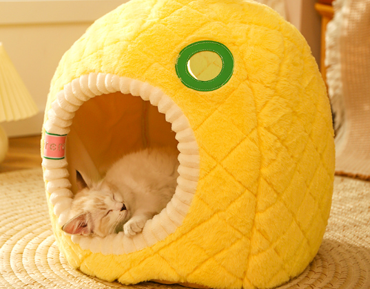 Unique pineapple-shaped cat cave pet bed, a fun and stylish piece of pet furniture for any home decor.