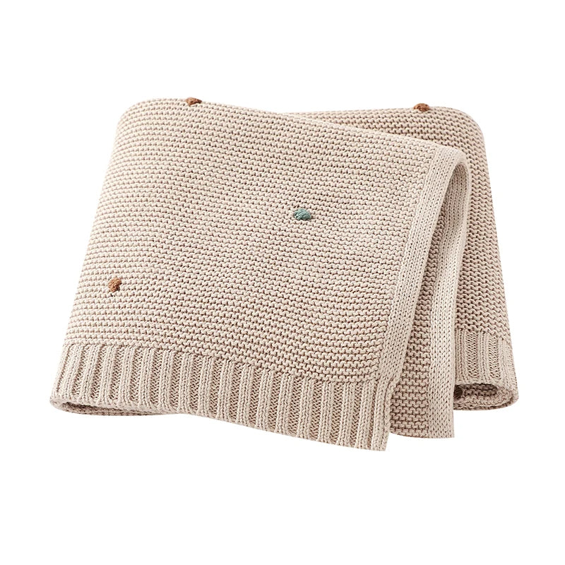 Unisex soft cotton knitted baby blanket for ultimate infant comfort, a versatile all-season nursery essential and newborn gift.