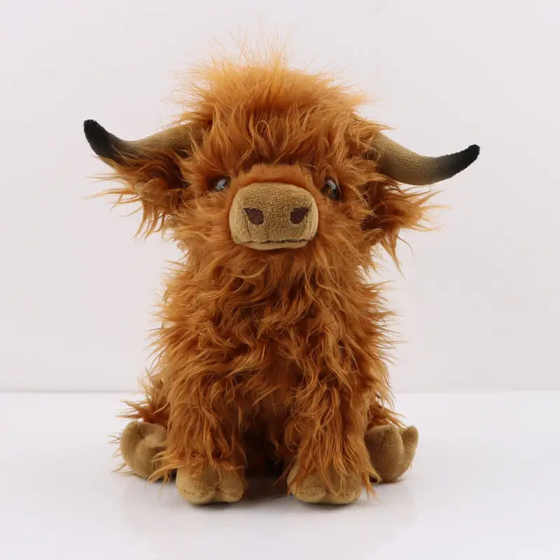 Soft & cuddly Unisex Highland Cow plush toy, a cute stuffed animal perfect for kids' comfort and play.