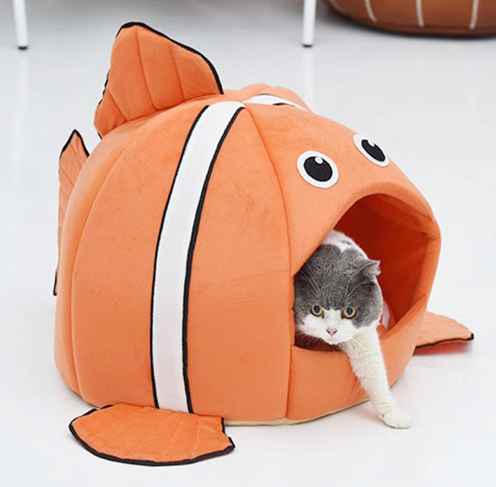 Plush fish-shaped cat cave, perfect soft pet bed for napping and hiding.
