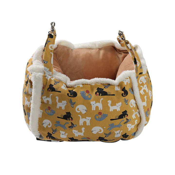 Designer cat bed, a fluffy sleeping basket with cute patterns for stylish pet furniture.