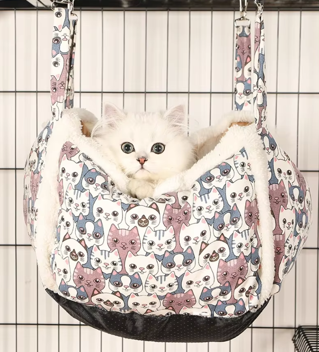 Fluffy cat bed with an adorable pattern, a plush pet accessory ensuring cozy cat naps.