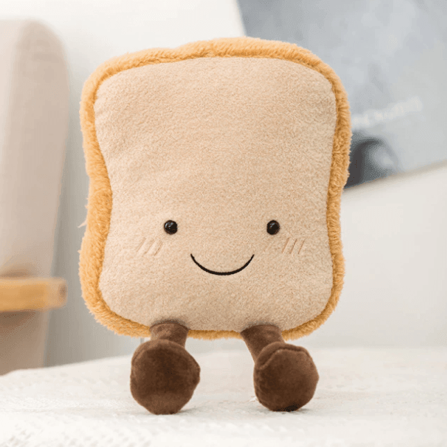 Fluffy pastry plush toy, a soft croissant stuffed animal perfect for cuddles, food plush lovers, or a unique kids gift.
