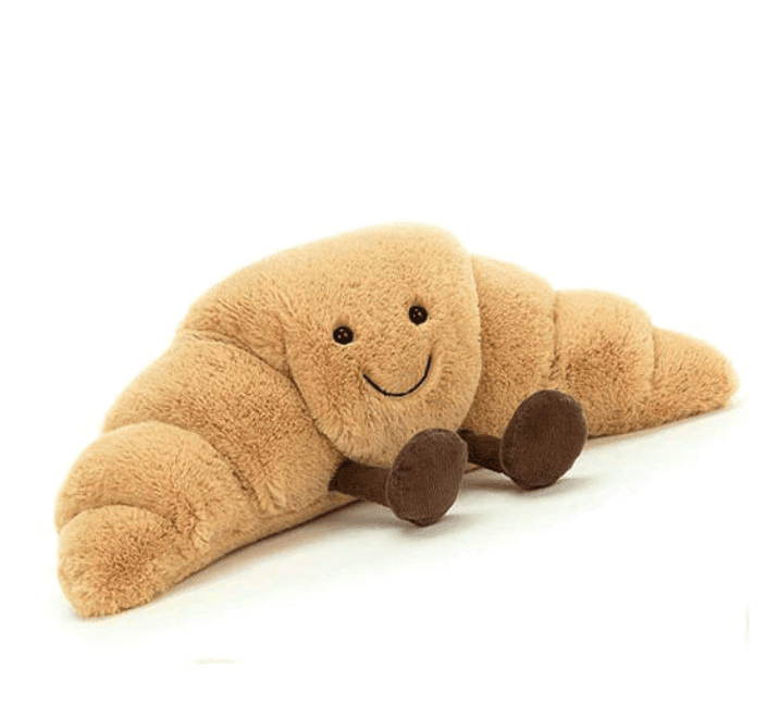 Unisex fluffy croissant plush toy, a cozy stuffed animal and decorative pillow for any room, ideal for kids & collectors.