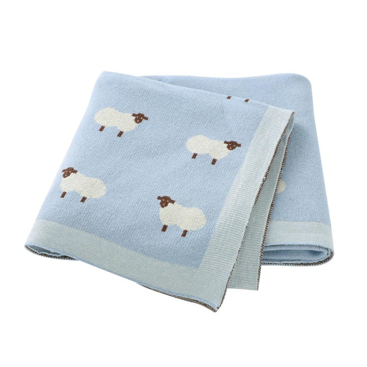 Close-up of soft knit cotton baby blanket texture, ideal for gentle swaddling and infant comfort.