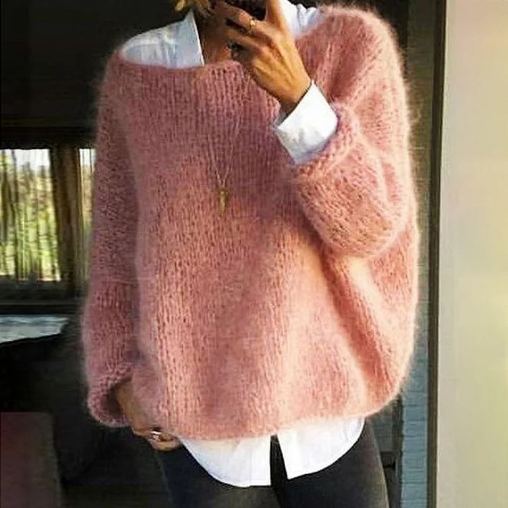 Soft oversized women's pullover sweater for cozy, comfortable wear. Perfect for autumn fashion.