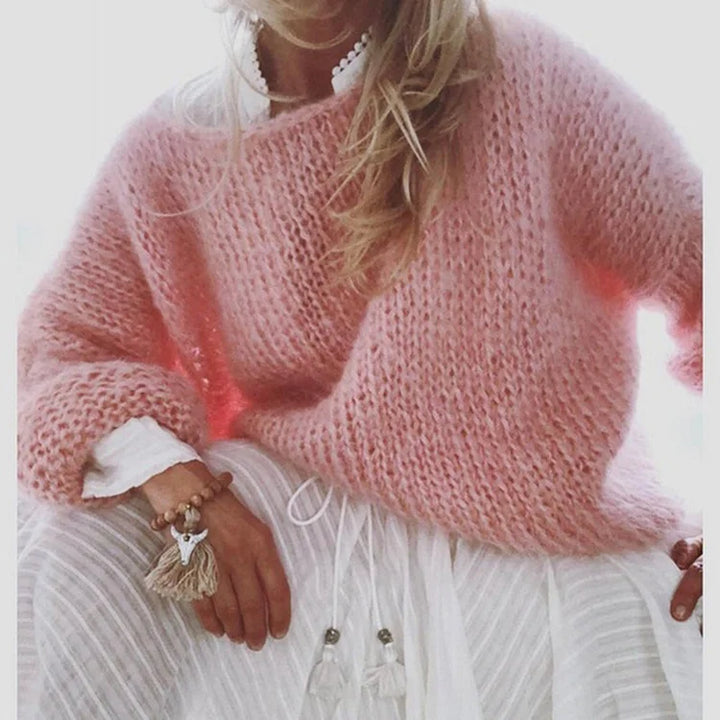 Elegant women's oversized sweater, a versatile cozy pullover for chic everyday style.