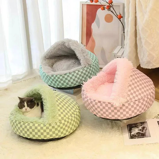 Soft plaid cat cave bed provides cozy warmth & comfort for felines. Washable pet bed, ideal for sleep.