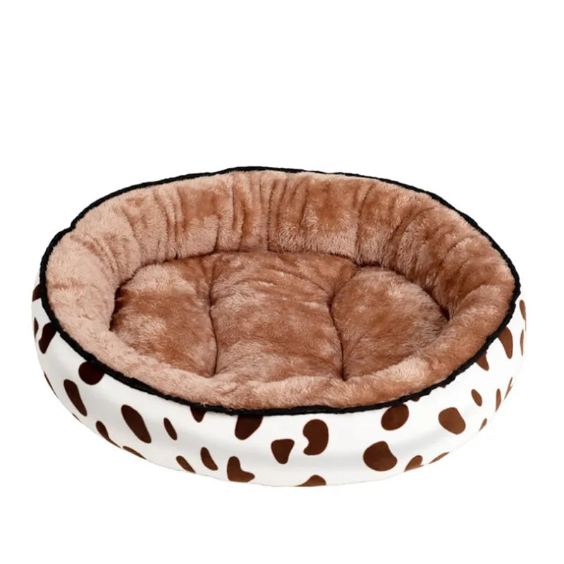 Unisex soft round dog bed, a washable pet furniture item for anxiety relief and comfort.