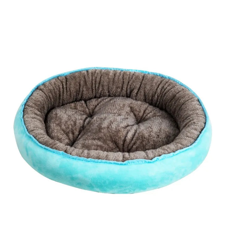 Plush, round pet bed for dogs & cats. Super soft, washable, and cozy for anxiety relief & comfort.