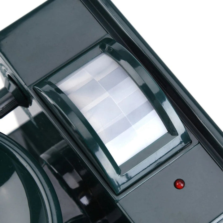Weatherproof solar bird repeller, motion sensor activates for garden protection.