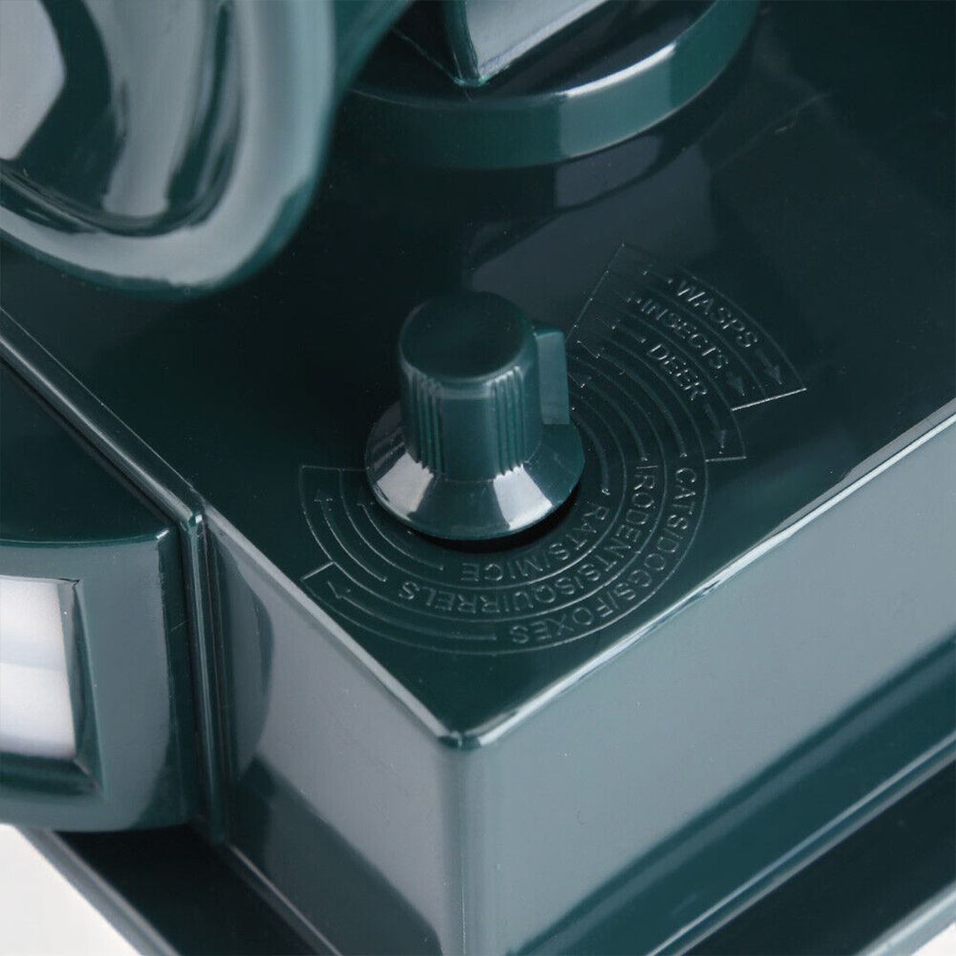 Solar-powered outdoor repeller, uses motion sensor to deter birds from plants.