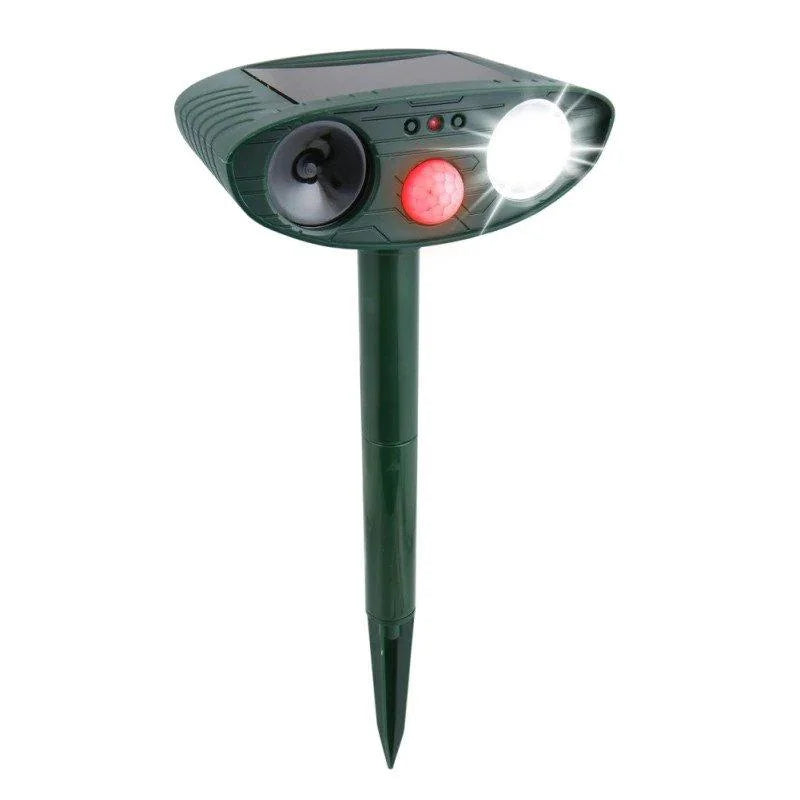 Solar Ultrasonic Deer Repeller protecting a lush garden naturally from pests.