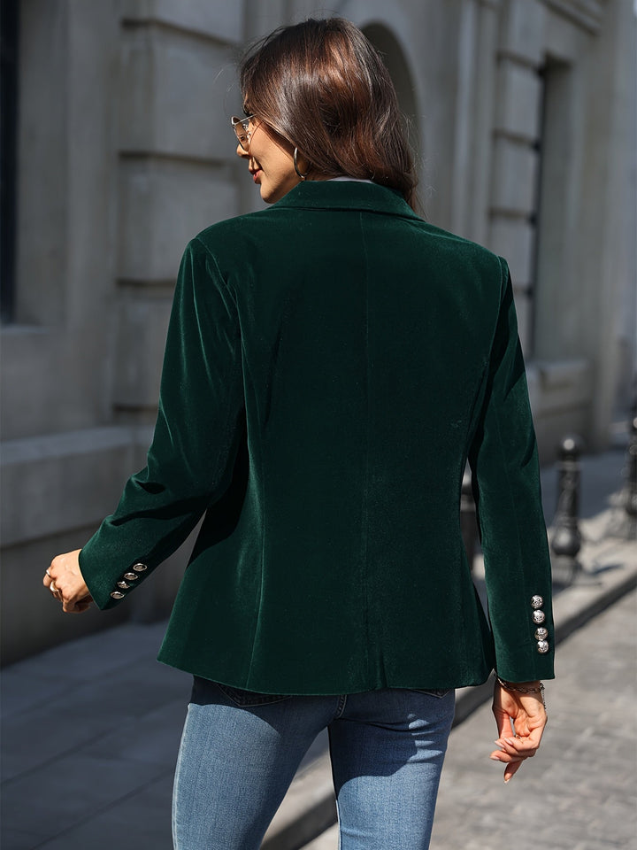 Elegant women's tailored blazer with a single button closure, ideal for formal office settings and business casual.