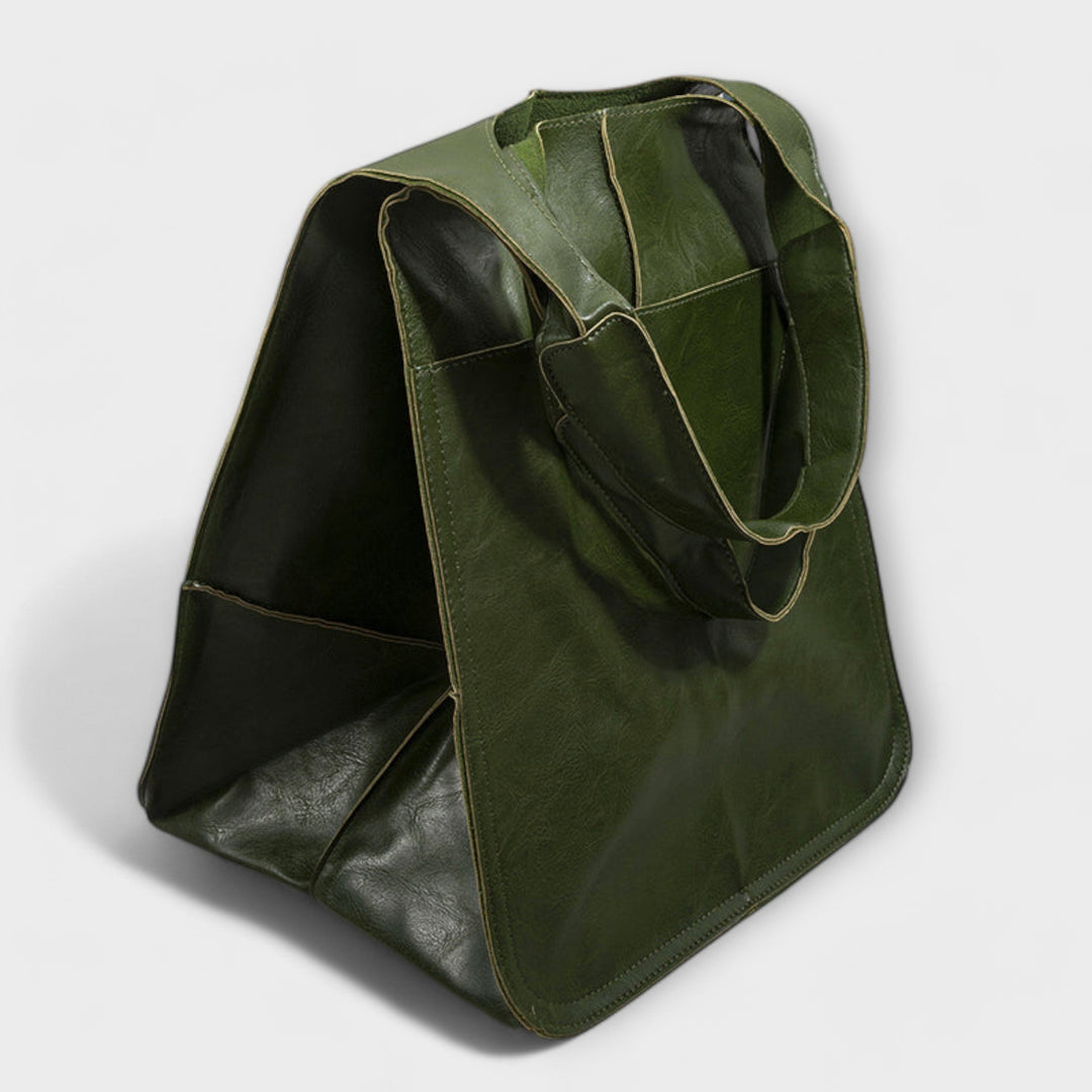 Women's minimalist shoulder bag in a durable fabric, ideal for daily use and travel.