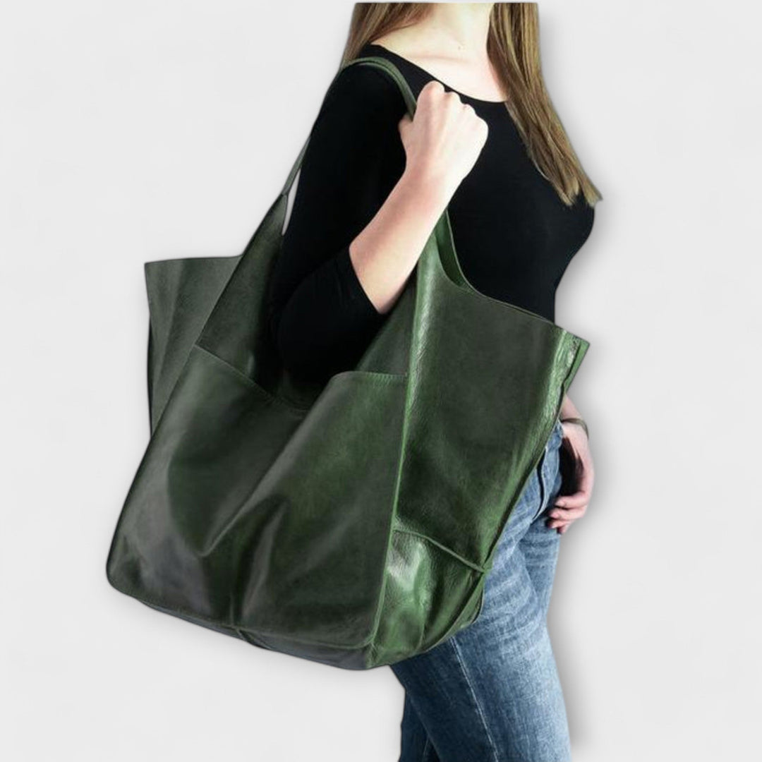 Minimalist tote bag for women, perfect for work or leisure, with a comfy wide strap.
