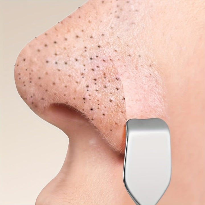 Stainless steel double blackhead remover tool for effective pore cleansing and blemish removal.