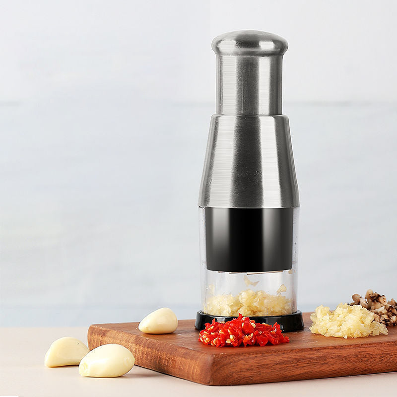 Efficient garlic press & mincer, perfect for easy food prep and cooking tasks.