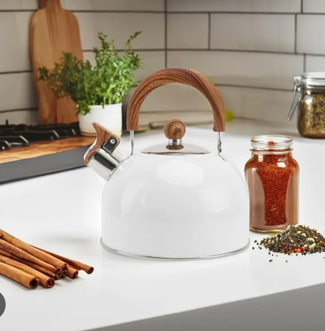 Premium 3-quart stainless steel whistling stovetop tea kettle, ergonomic handle, durable kitchen appliance.