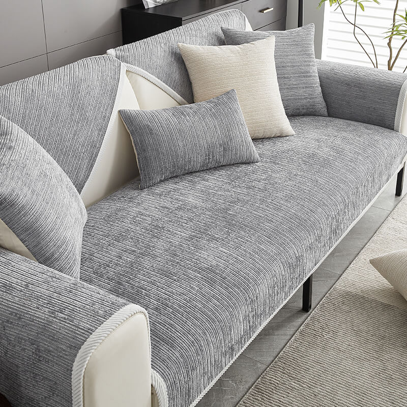 Durable anti-scratch chenille sofa cover. Protects living room furniture from pet claws & wear.