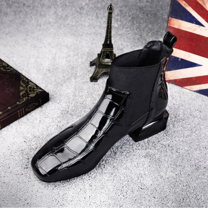 Stylish black women's ankle boots, comfortable and durable everyday casual footwear.