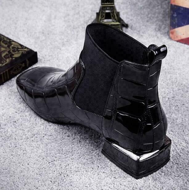 Durable black women's walking boots, comfortable and stylish everyday casual footwear.