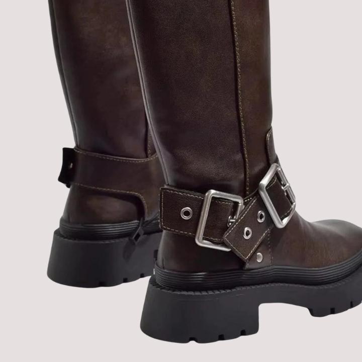 Brown women's buckle strap knee-high boots, a stylish and comfortable choice for winter and autumn fashion.