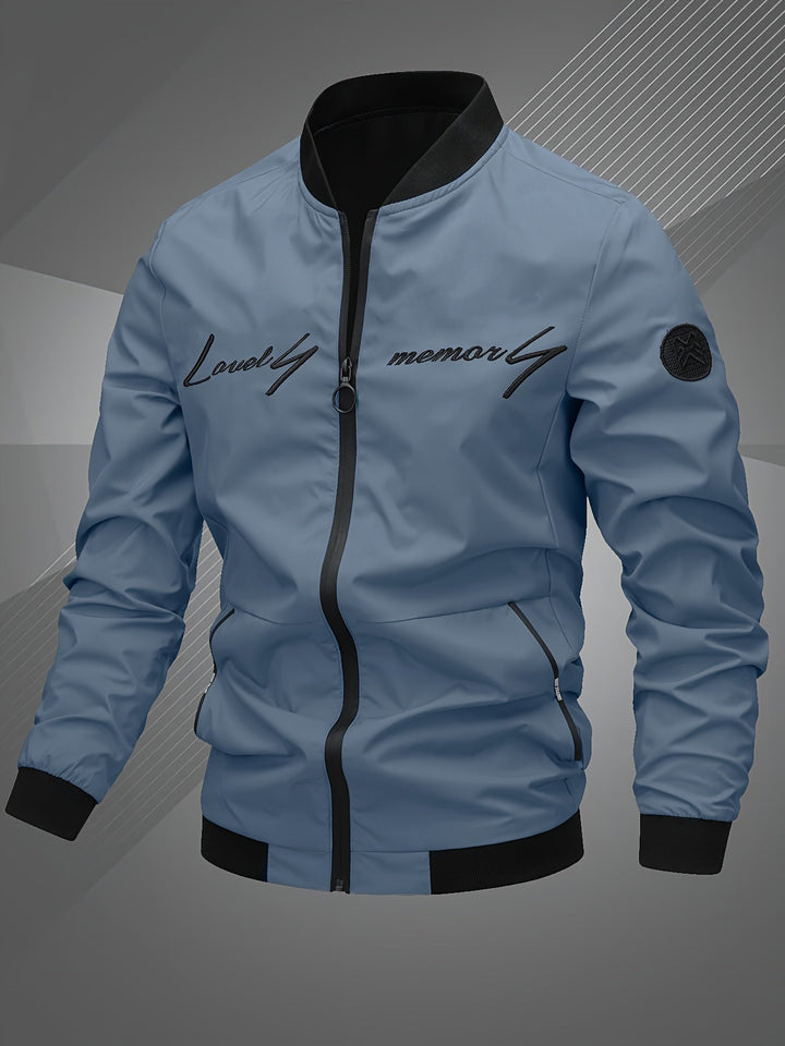 Close-up of the zipper detail on a men's stylish bomber jacket, showcasing quality menswear.