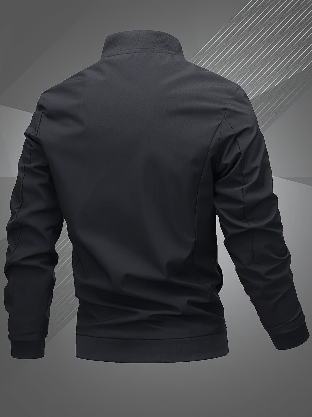 Stylish men's bomber jacket in a neutral color, open over a t-shirt, for a relaxed fashion look.