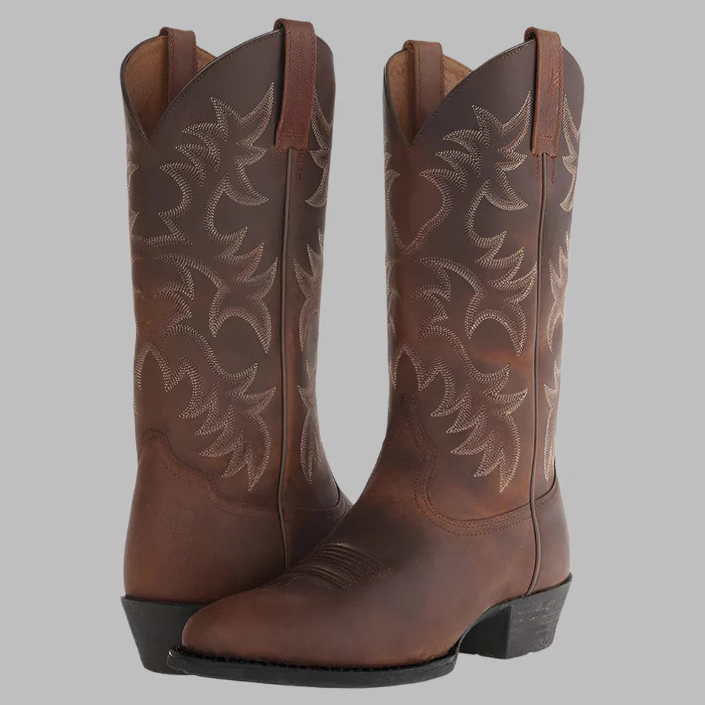 Stylish men's black cowboy ankle boots. Western pull-on design for casual or dress wear. Comfortable autumn footwear.