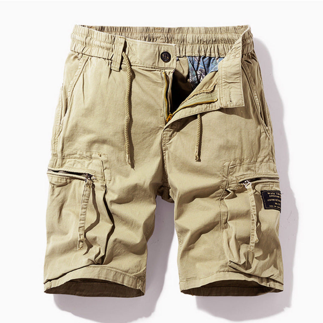 Durable men's cargo shorts designed for outdoor adventure, offering comfort & utility for active wear.