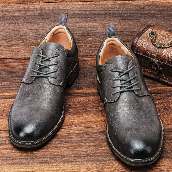 Versatile men's dark grey booties, perfect as stylish dress or casual footwear with non-slip grip.