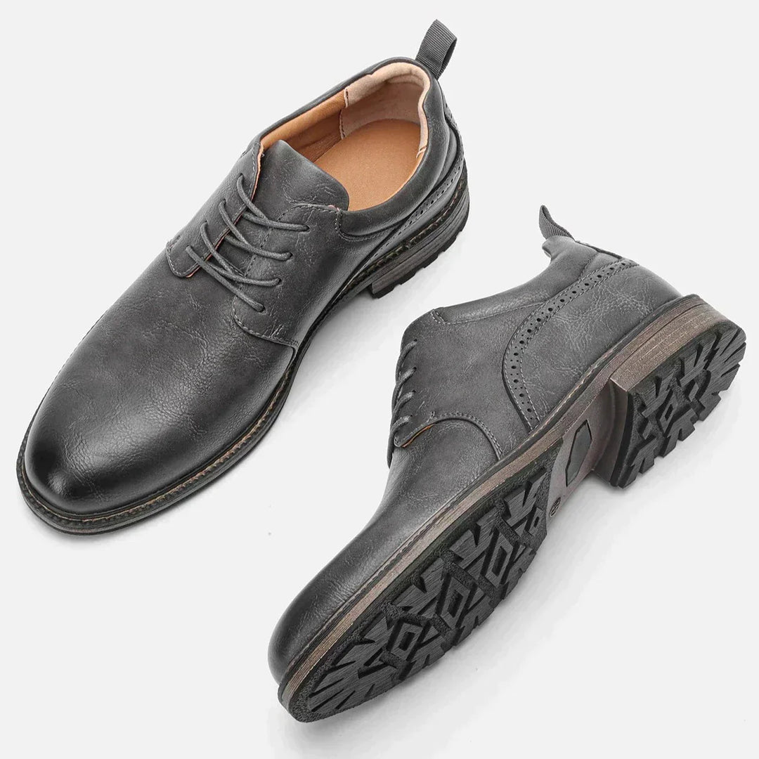 Dark grey men's premium footwear booties, designed for style, comfort, and non-slip security in any setting.