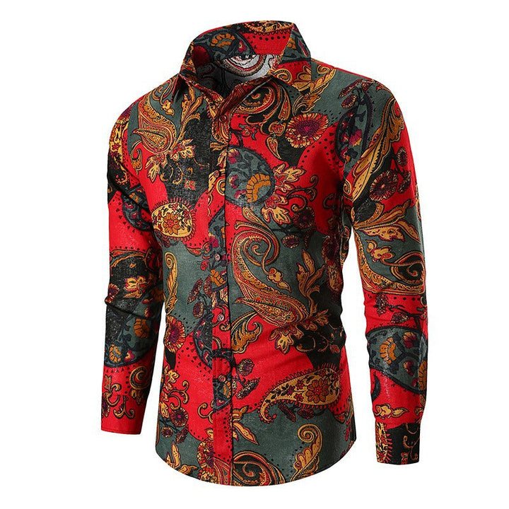 Close-up of a men's comfortable long sleeve shirt featuring a vibrant, detailed paisley pattern. Party-ready.