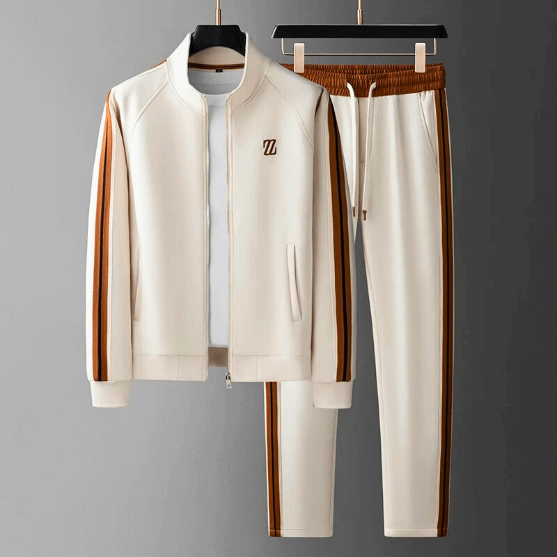 Comfy men's activewear tracksuit. Modern matching top and bottom for athletic or relaxed style.