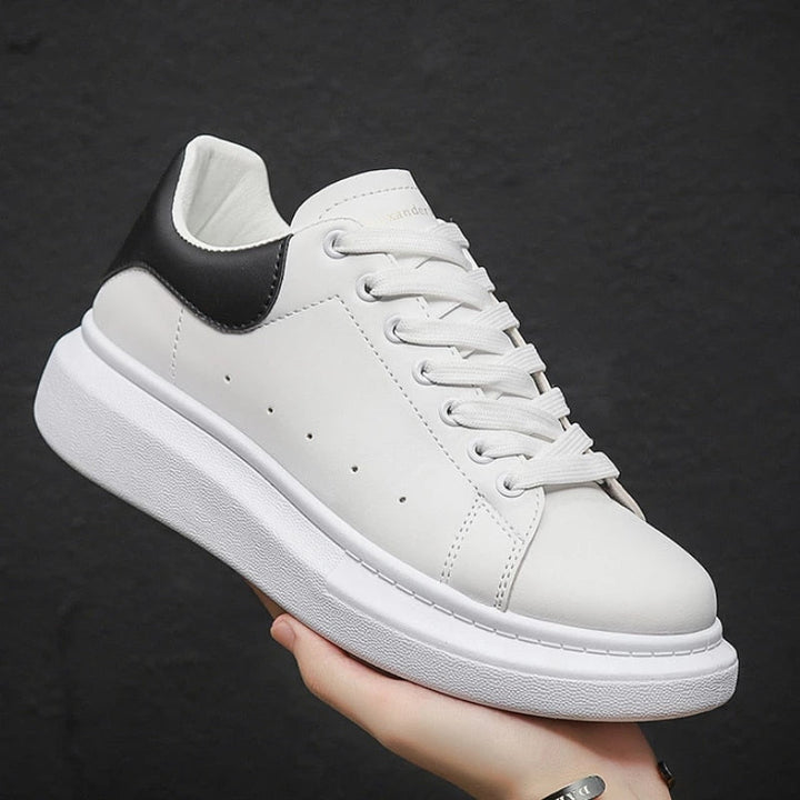 Sleek men's urban sneakers. Comfortable and stylish everyday trainers for versatile casual fashion.
