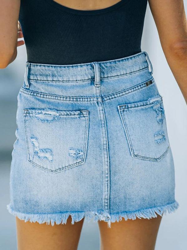 Trendy women's short blue skirt, perfect for a stylish summer outfit. Casual mini skirt for effortless fashion.