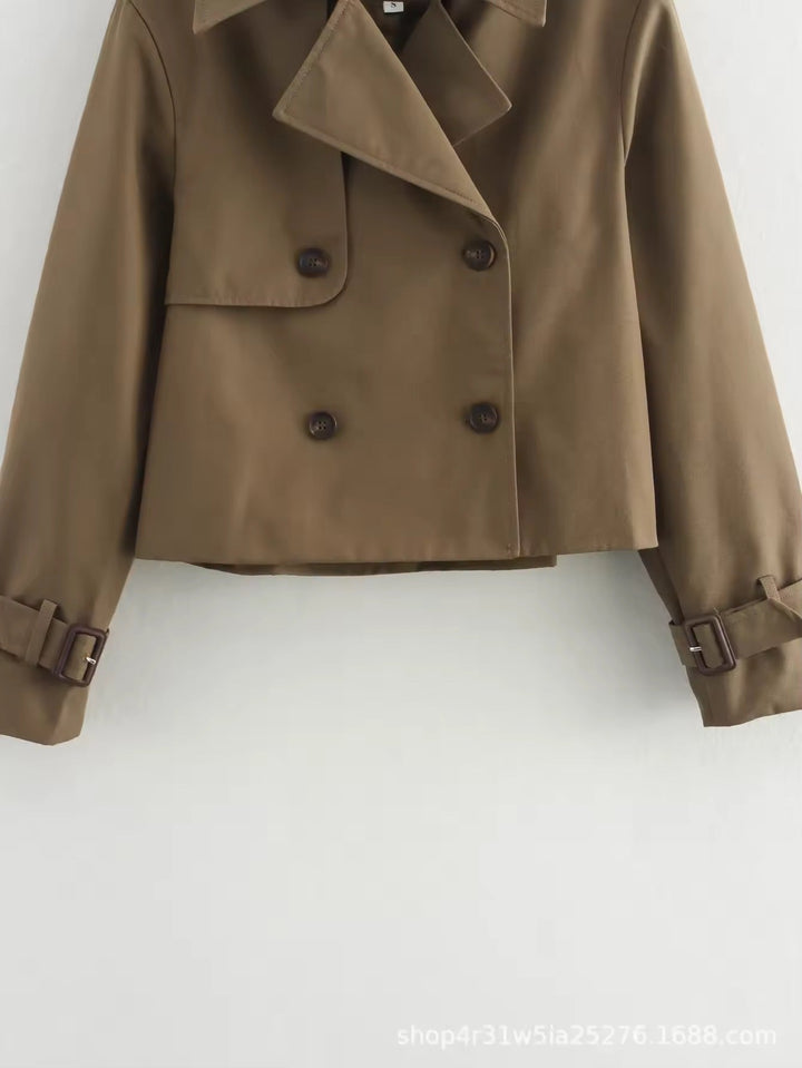 Stylish women's cropped trench coat. Versatile outerwear for spring & fall fashion, offering comfort & chic style.