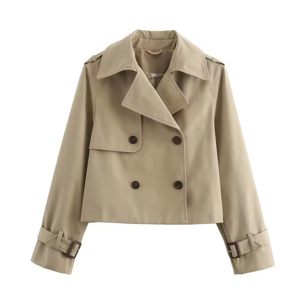 Fashionable women's cropped trench coat. Elegant outerwear, a comfortable and stylish jacket for any women's seasonal fashion.