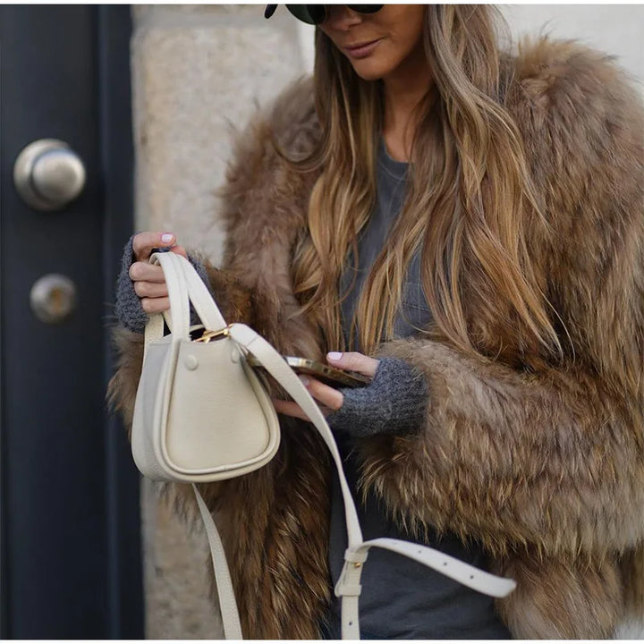Elegant long-sleeve women's cropped jacket, ideal for winter chic fashion, evening wear, and casual style.