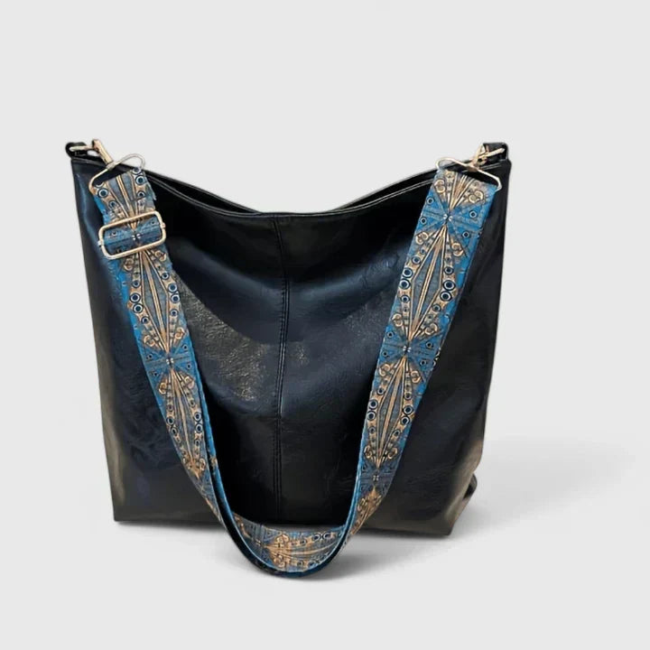 Modern women's crossbody tote bag, combining style and functionality for a fashionable look.