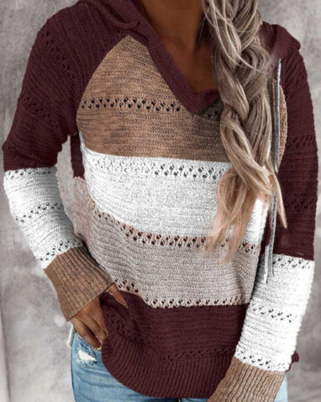 Versatile women's fashion hoodie. Stylish long sleeve pullover sweatshirt for modern casual wear.