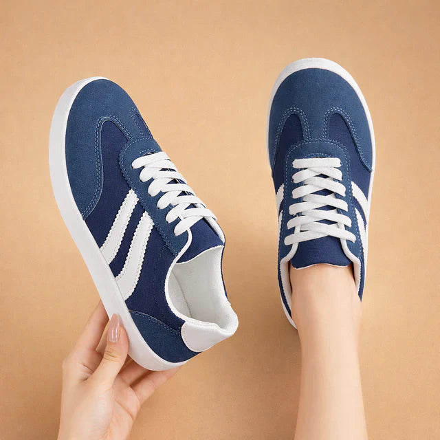 Vibrant women's fashion sneakers, lace-up design for stylish comfort. Ideal casual walking shoes.