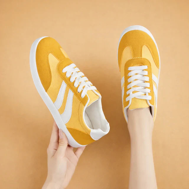 Comfortable women's walking shoes, lace-up sneakers for an active lifestyle and versatile everyday wear.
